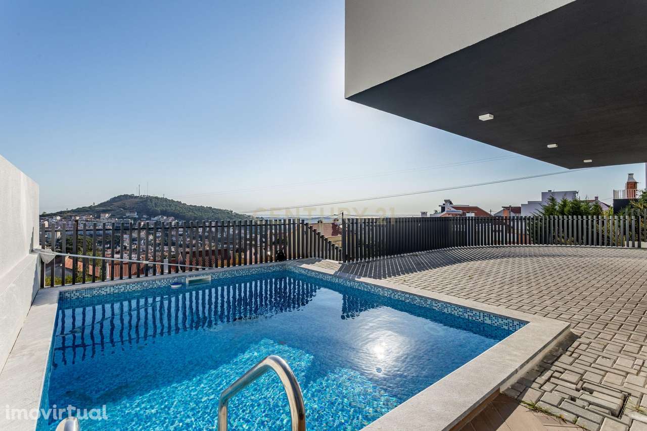 Moradia T4 de Sonho com Piscina em Odivelas.  Onde o Luxo e a Tranquil - Grande imagem: 4/59