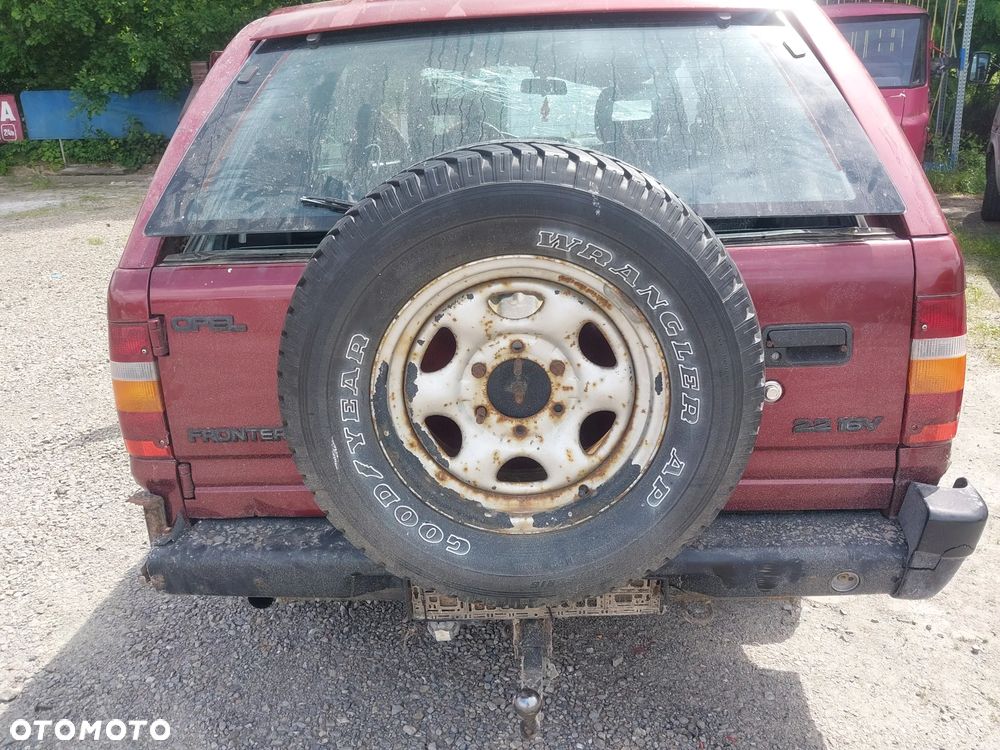 Opel Frontera A Koło zapasowe mocowanie koła zapasowego dojazdówki - 1