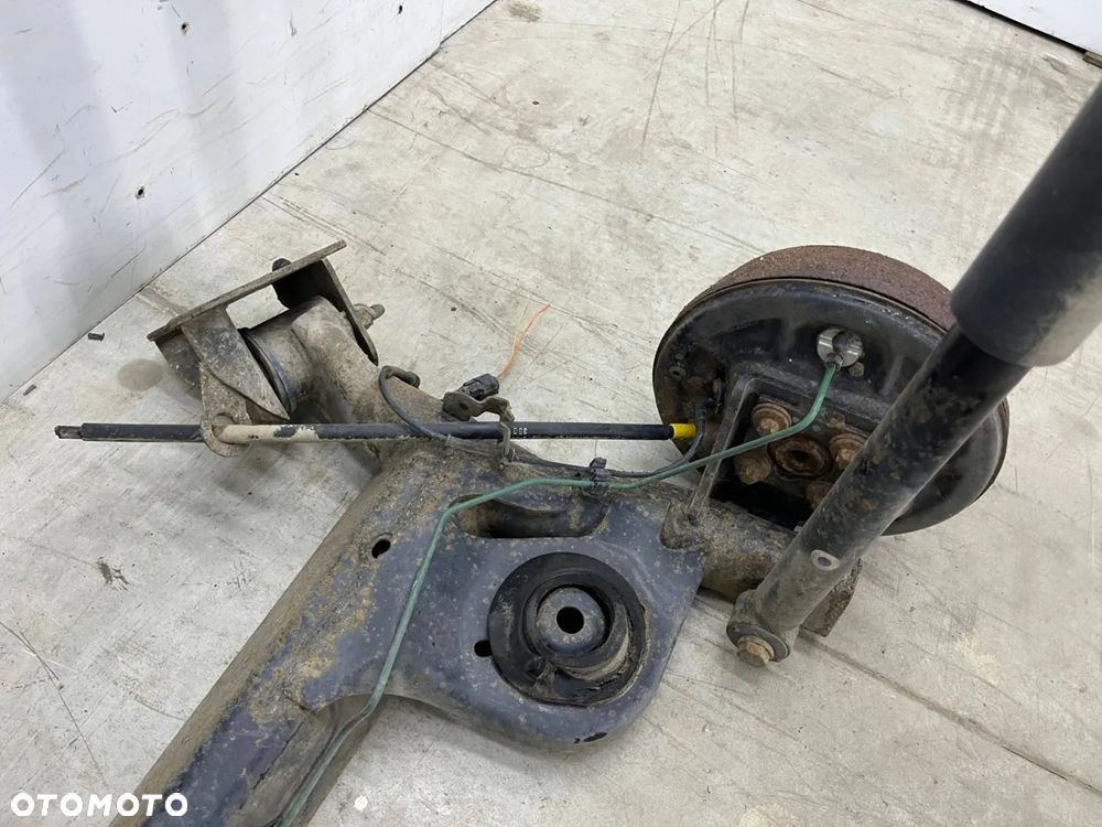 Belka zawieszenia Dacia Logan 1 I MCV kombi VAN 05-14r. DOSTAWCZAK tylna oś wózek amortyzatory ABS - 23