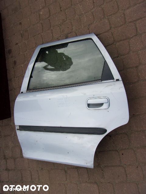 SZYBA DRZWI OPEL VECTRA B LEWA TYLNA - 1