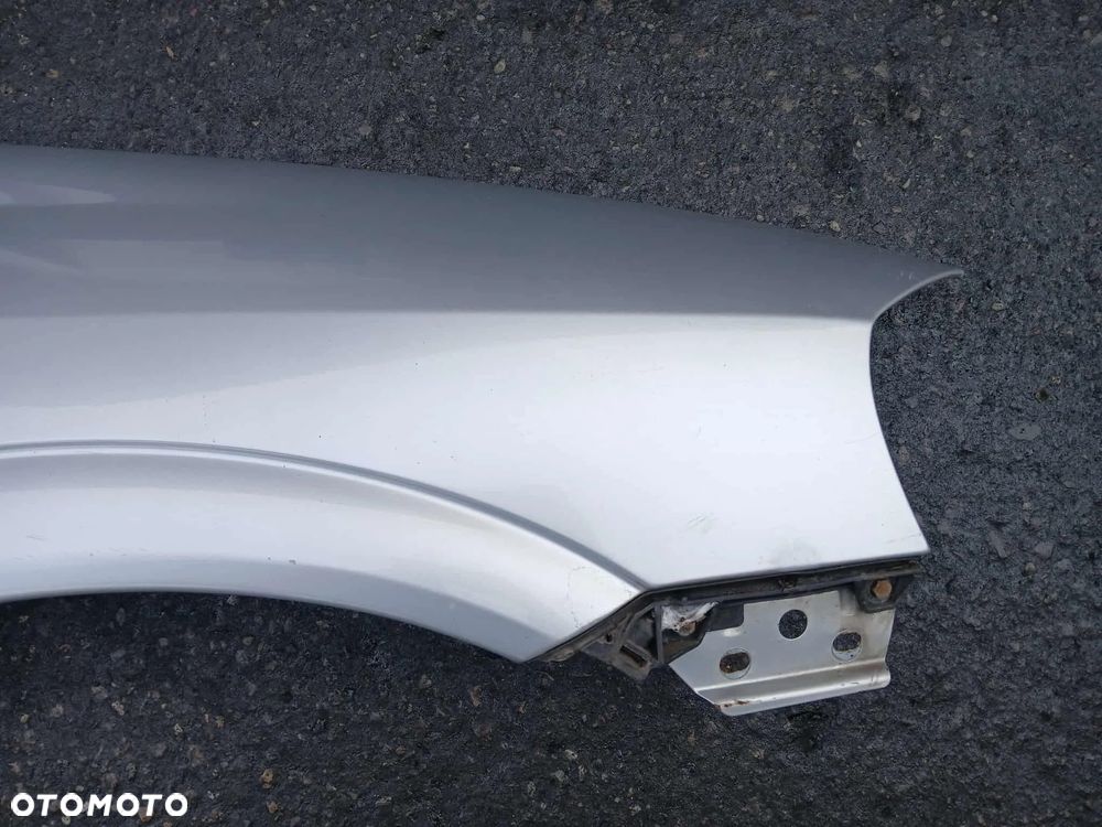 Opel Astra II G  Błotnik prawy kod lakieru Z147 - 2