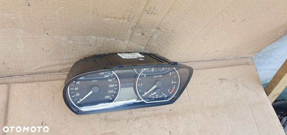 Licznik zegary BMW 1 E81 E87 2.0i 1024932 9220941 - 2
