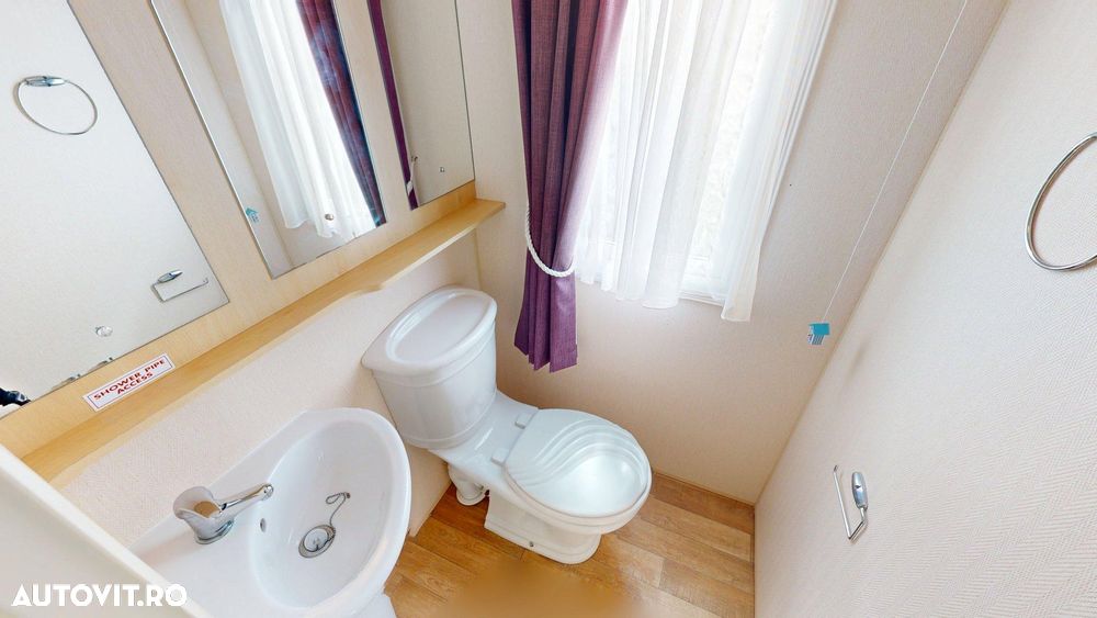 Alta Casa mobila W. Winchester nr. 172 | Tâmplărie PVC şi încalzire centrală pe gaz cu calorifere | 12 x 3.7 m | 2 dormitoare şi 2 băi - 8