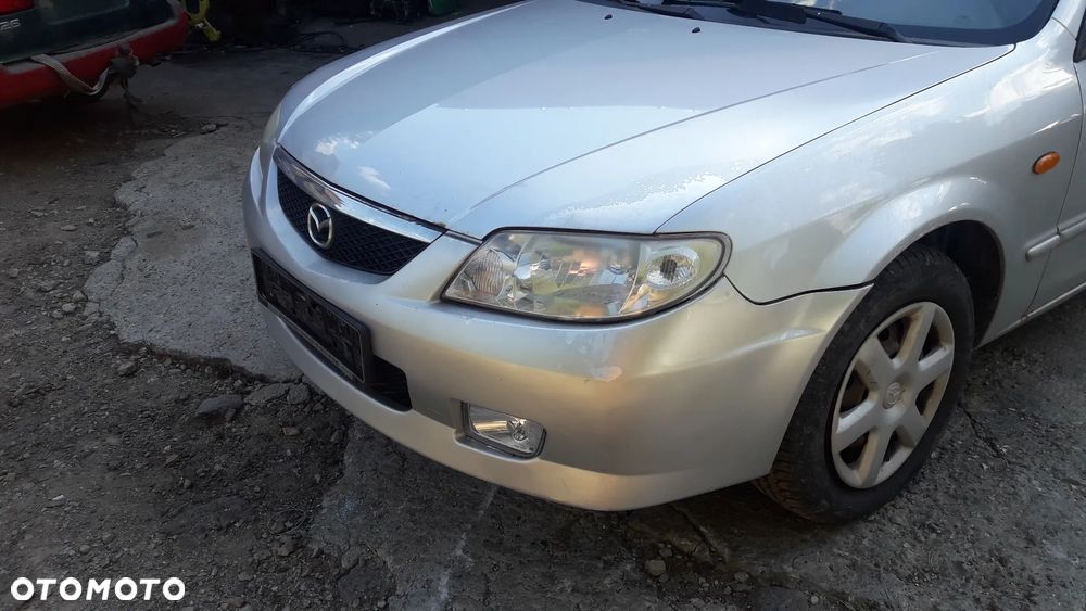 Mazda 323 323f BJ 98-03 Lift  Maska lampa zderzak pas atrapa 22V - 9