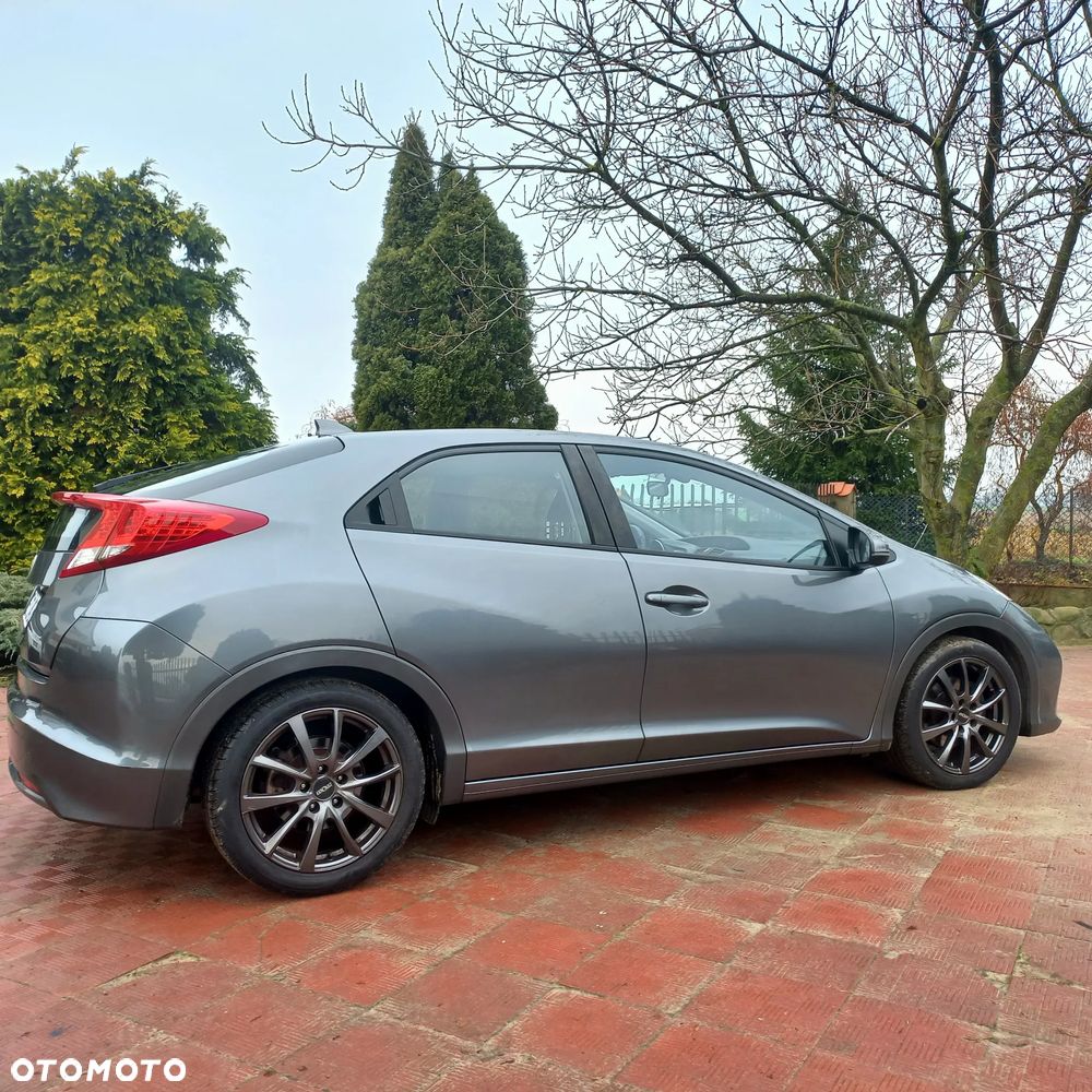Honda Civic 1.4 i-VTEC Comfort - 23