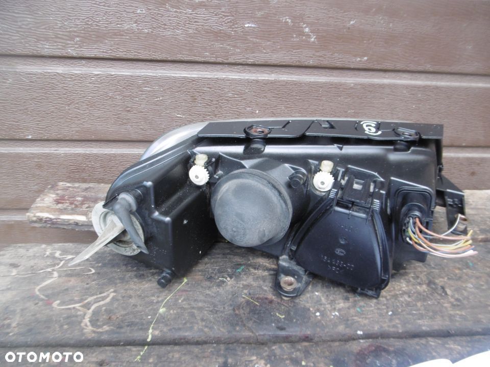 Lampa lewa VW PASSAT B5 LIFT HELLA EUROPA - 5
