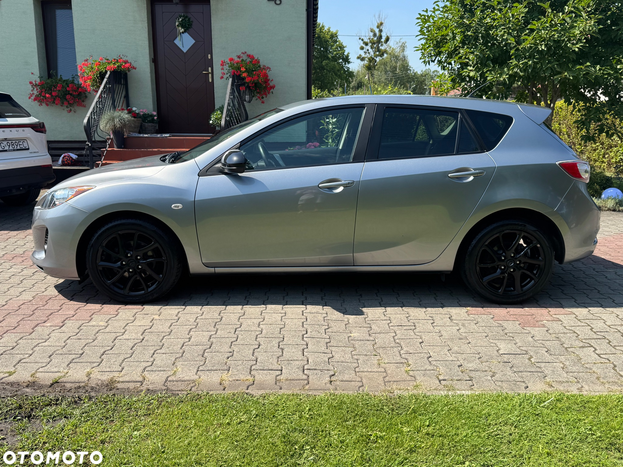 Mazda 3 1.6 Exclusive + - 3