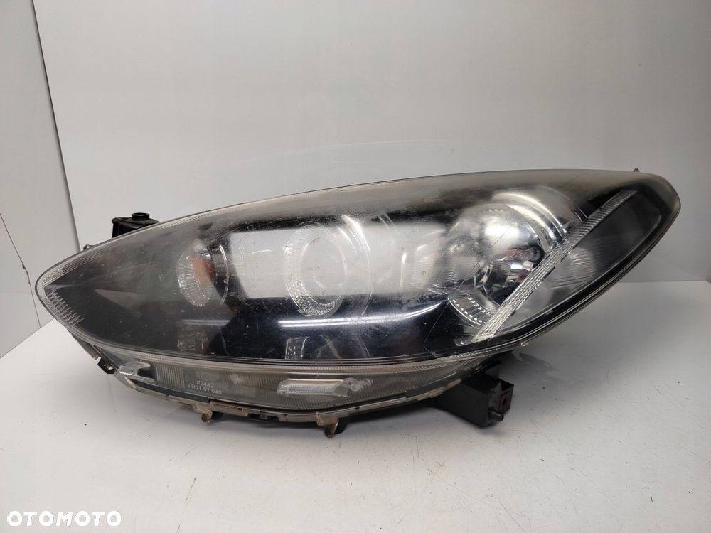 mazda 2 de 2011r reflektor lampa lewy przód lewa przednia soczewka - 1