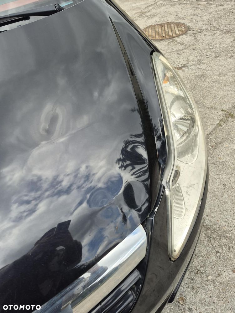 Opel Corsa 1.4 16V Cosmo - 17