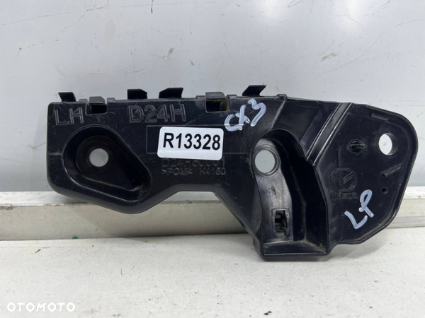 Ślizg Mazda CX-3 14-21r. lewe przednie mocowanie błotnika zderzaka wspornik d24h500u1 d10j500u1