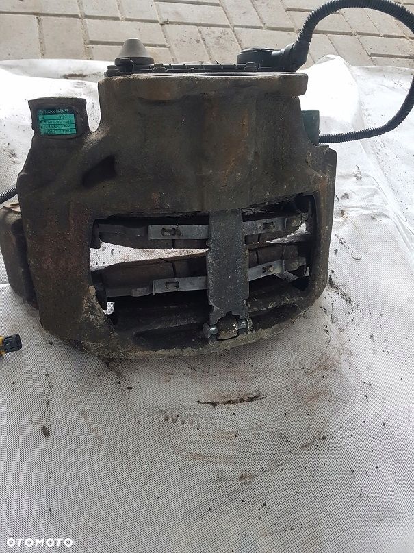 ZACISK HAMULCOWY LEWY PRZÓD MAN TGL TGM KOŁA 19,5