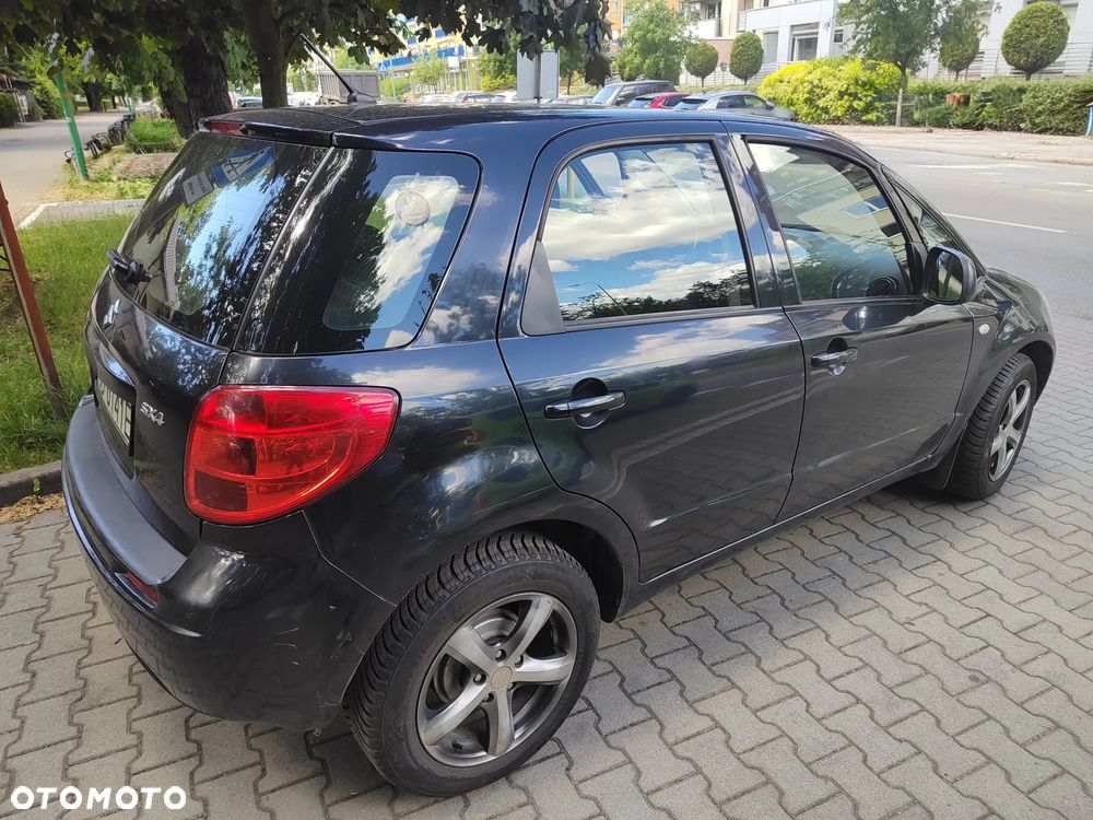Suzuki SX4 1.6 GLX / Comfort - 11