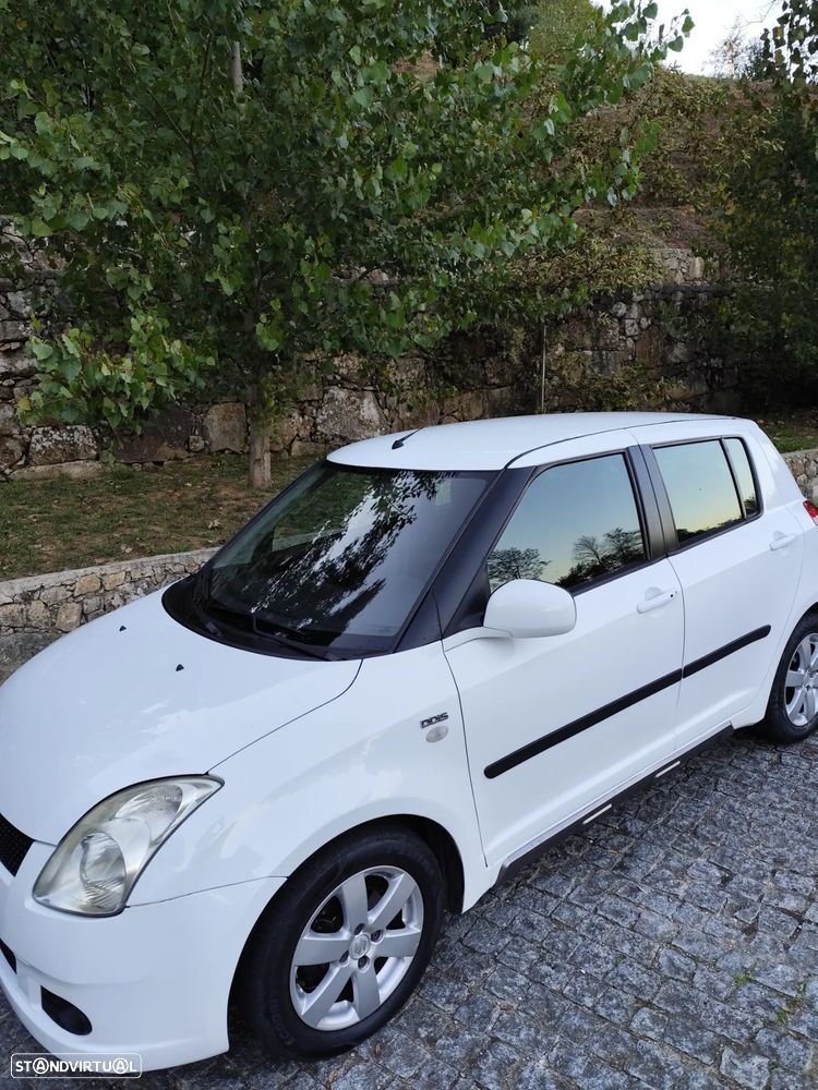 Suzuki Swift 1.3 DDiS Quiksilver - 1