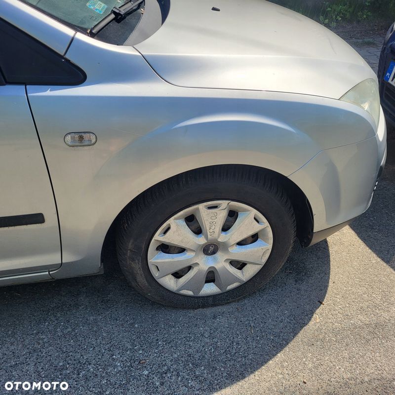 FORD FOCUS MK2 04-07r BŁOTNIK PRAWY PRZÓD KOD 08 - 1