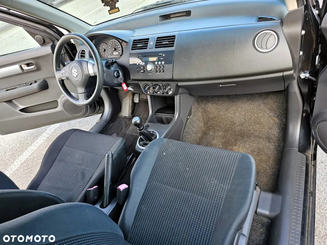 Suzuki Swift 1.3 Comfort - 21