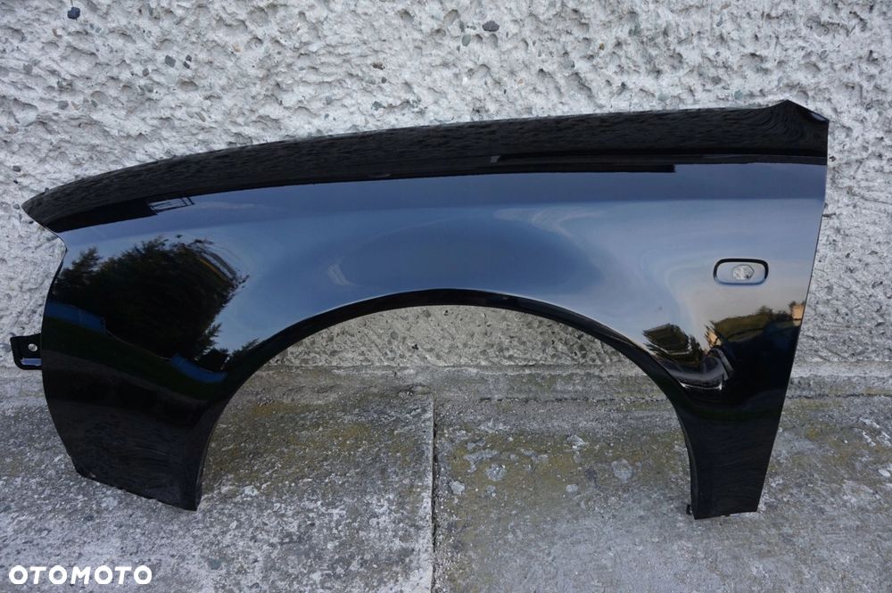 BŁOTNIK PRZEDNI LEWY AUDI A6 C5 97/01r LY9B