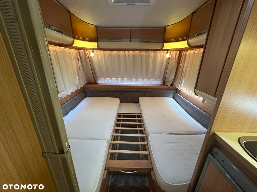 Adria ADORA 472 LU z napędem i markizą ze ścianami.  DMC 1300 - 37