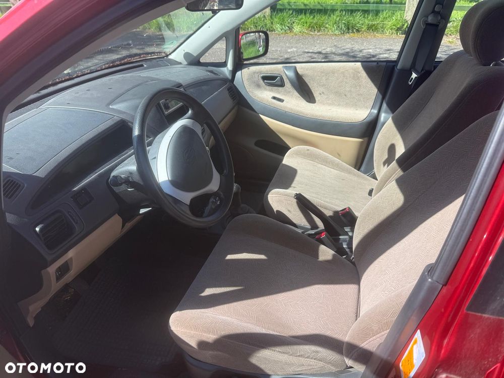 Suzuki Liana 1.6 - 9
