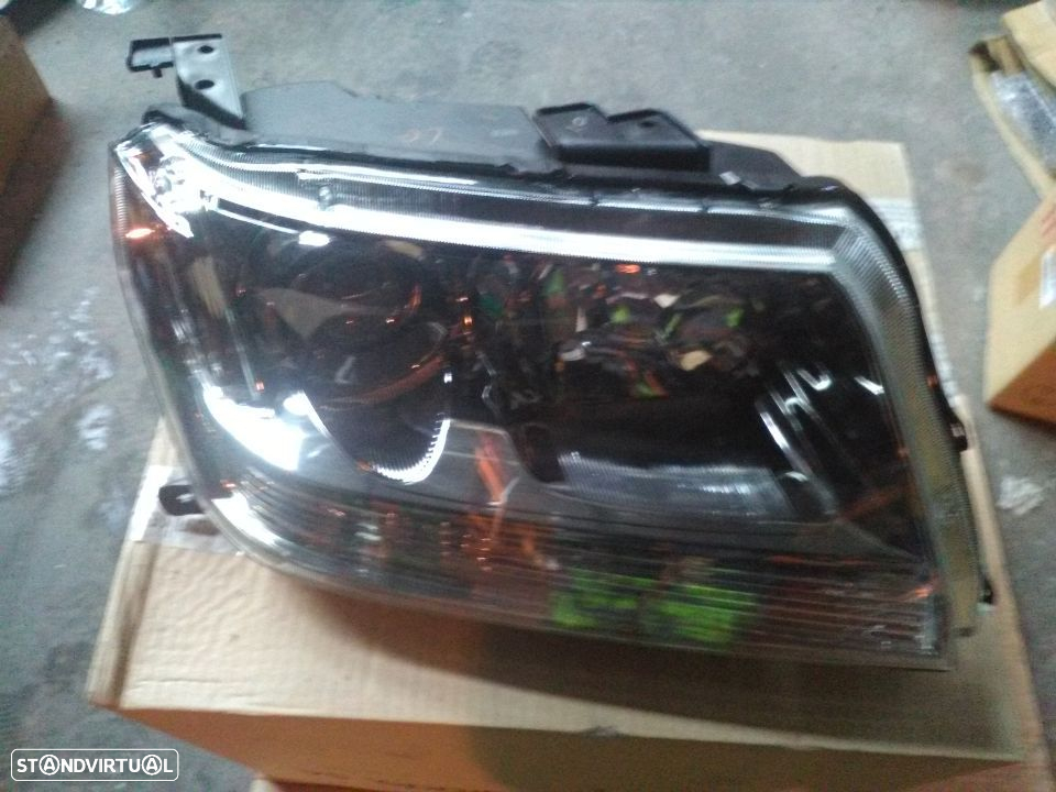 Farol frente grand vitara 2006  novo - 2