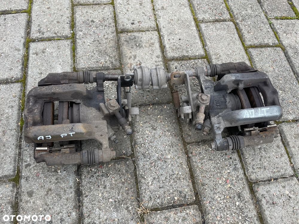 OPEL ASTRA J 4 IV ROK ZACISK hamulcowy jarzmo tył tylni PRAWY LEWY