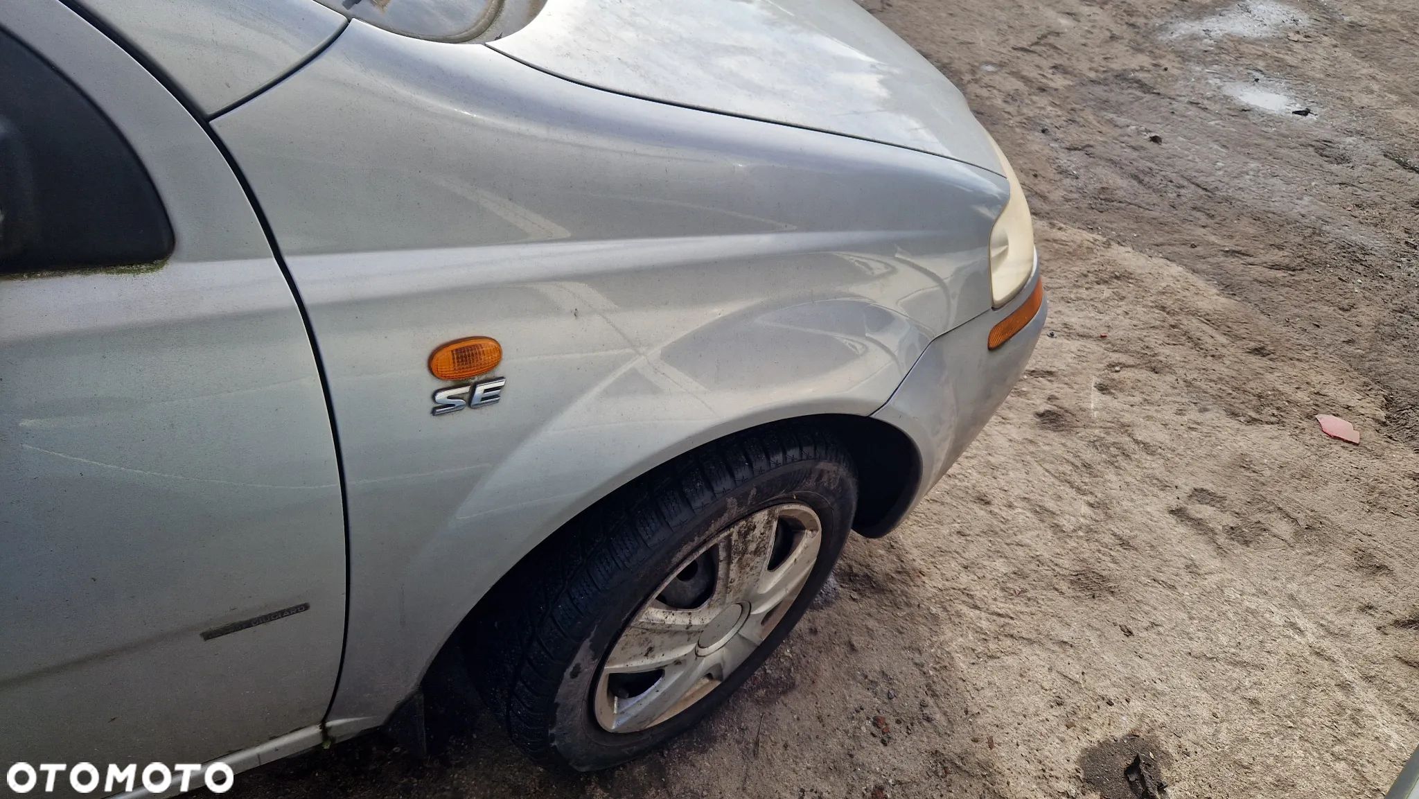 CHEVROLET AVEO BŁOTNIK PRAWY PRZÓD 95U - 1