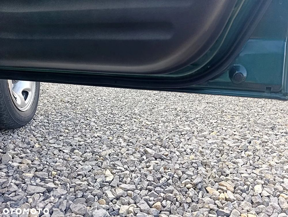 Suzuki Grand Vitara 2.0 - 17