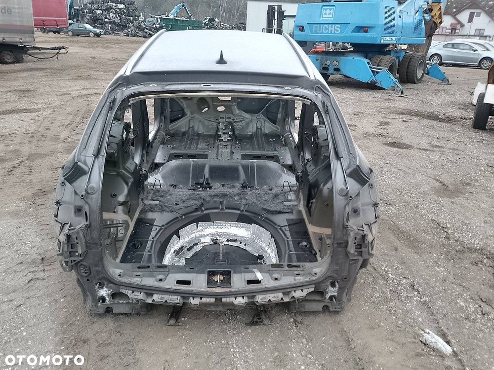 BŁOTNIK LEWY TYŁ OPEL ASTRA J Z177 KOMBI - 5
