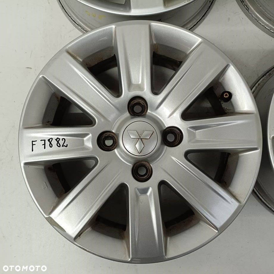 Alufelgi 4x114,3 15 Mitsubishi Colt 4250A756 4szt (F7882) - 2