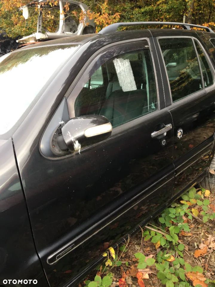 Drzwi przód lewe Mercedes ML W163 lift kod lakieru-197