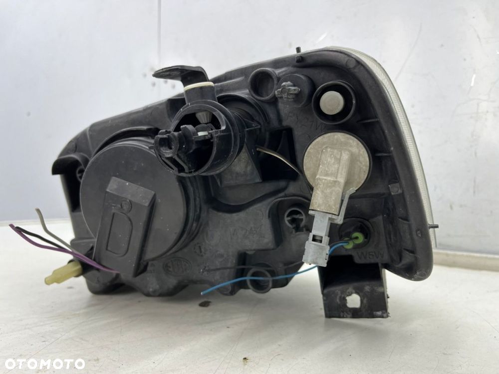 Lampa reflektor Dacia Logan I 04-08r. PRAWA  przednia zwykła prawy przód 8200211006 - 10