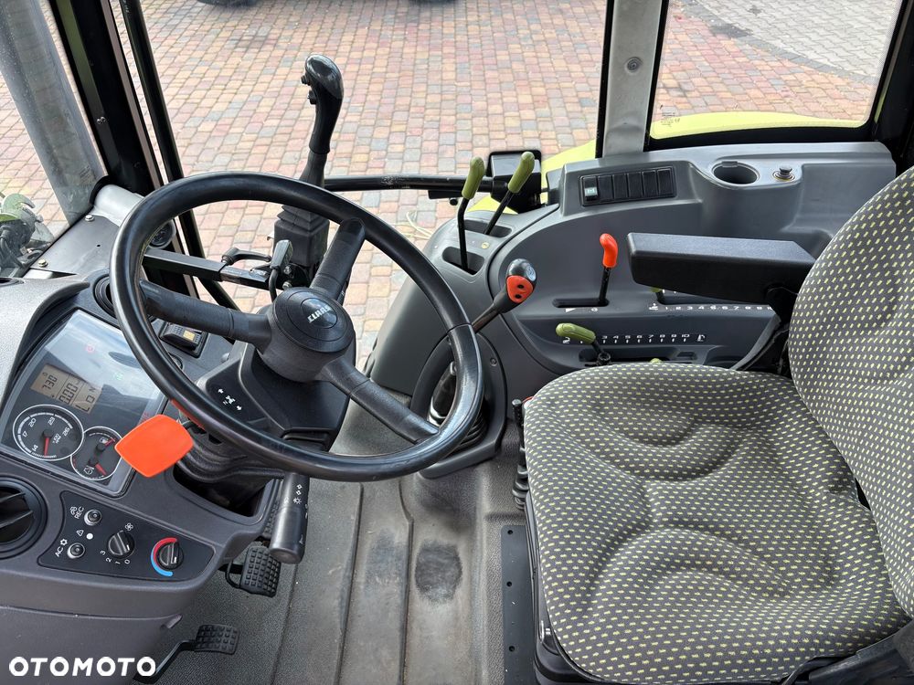 Claas Axos 310 + ładowacz - 9