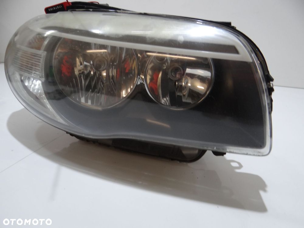LAMPA PRAWA PRZEDNIA BMW E88 OE 7263642 - 2