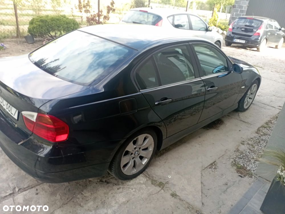BMW E90 2006 photo 5