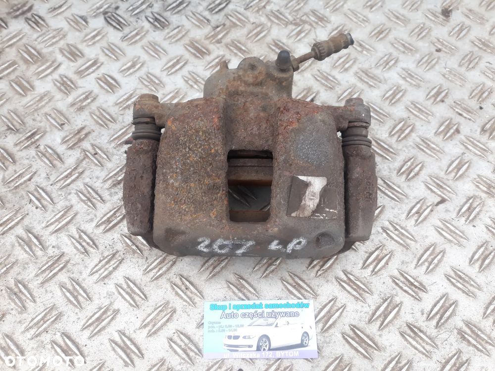 ZACISK LEWY PRZÓD PEUGEOT 207  1,4 16V
