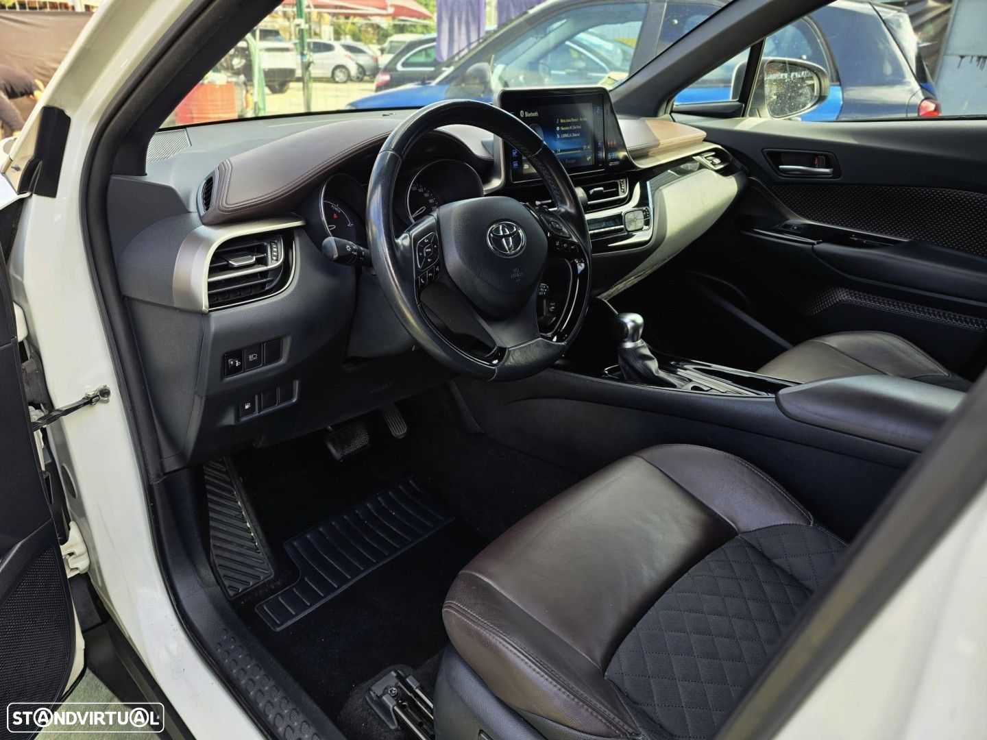 Toyota C-HR 1.8 HSD Exclusive+P.Luxury - 14