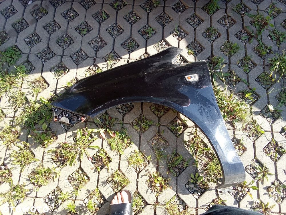 KL BŁOTNIK LEWY PRZÓD OPEL CORSA D 06- 5D - 1