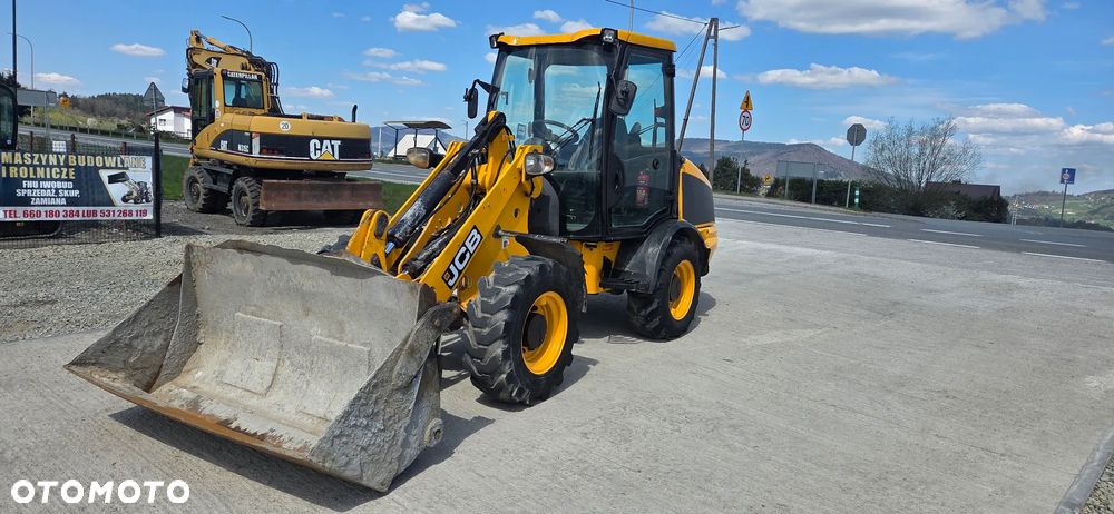 JCB 406 - 2