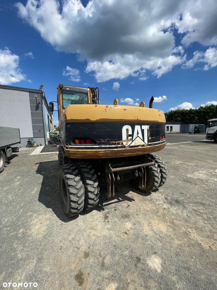 Caterpillar M316C - 6