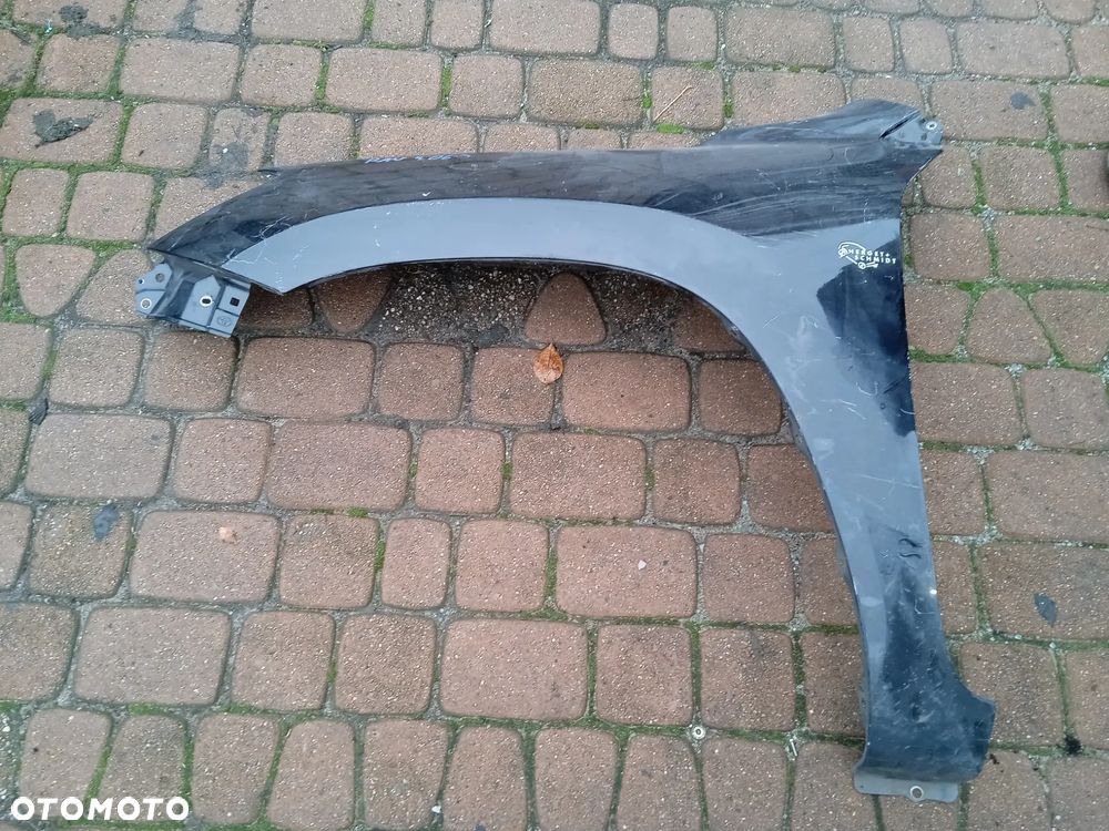 BŁOTNIK LEWY TOYOTA RAV 4 06- - 1
