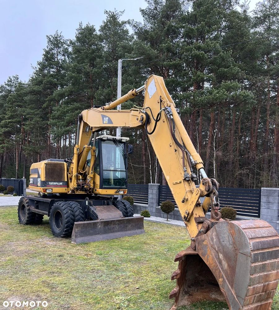 Caterpillar M312 - 4