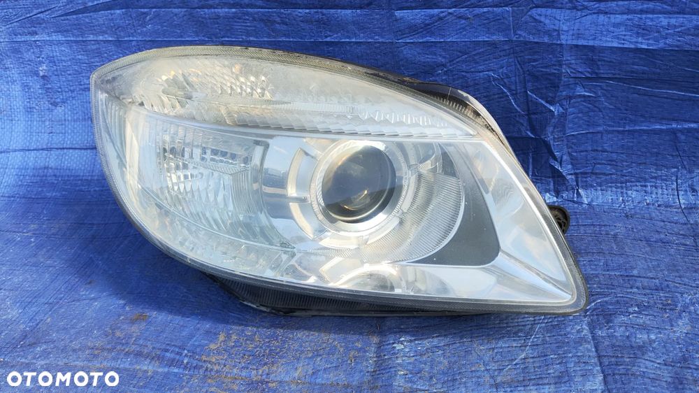 REFLEKTOR LAMPA SOCZEWKA LEWY PRZÓD HELLA EUROPA SKODA FABIA II ROOMSTER 07-10r - 8
