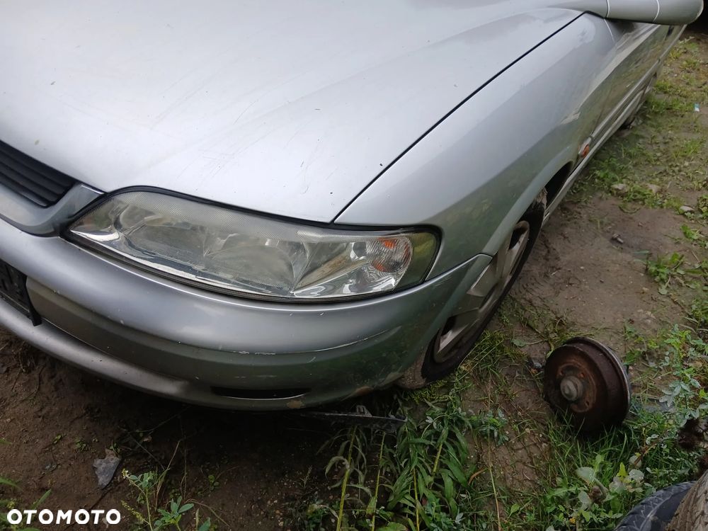 OPEL VECTRA B LIFT HB L157 fotel fotele kanapa deska kokpit podsufitka boczek boczki klamka - 1