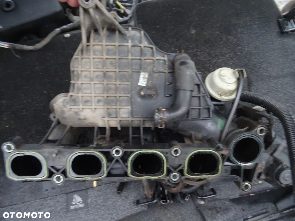 WYPRZEDAZ FORD MAVERICK MAZDA TRIBUTE 2,3 150KM TRIBUTE KOLEKTOR SSACY ORYGINal czesci - 2