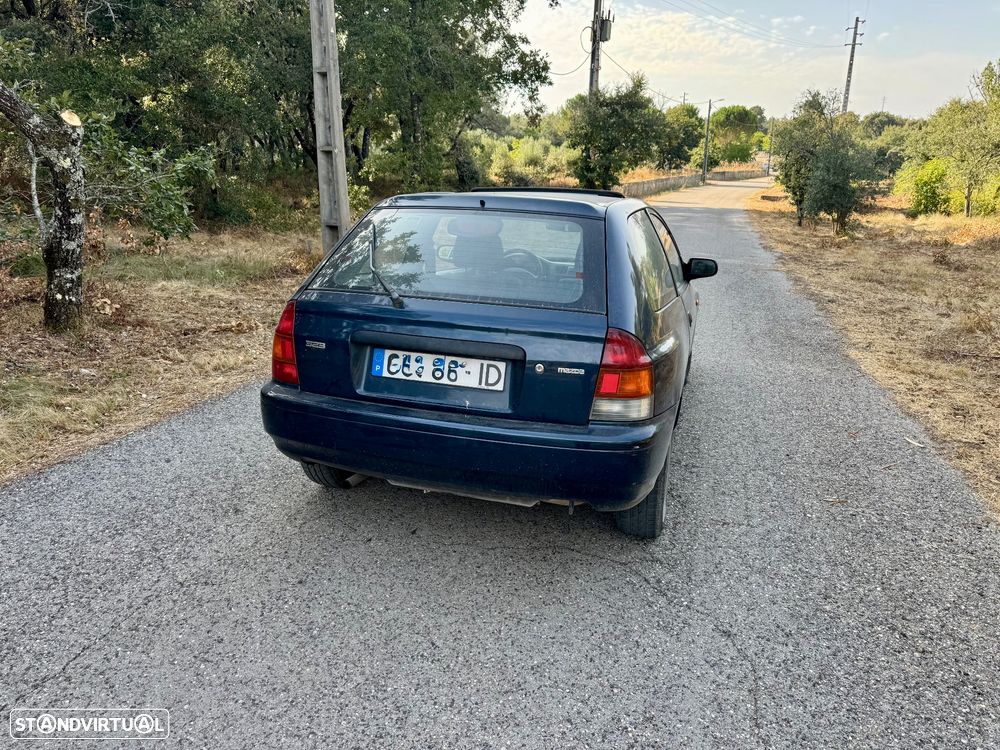 Mazda 323 P 1.3 TA - 4