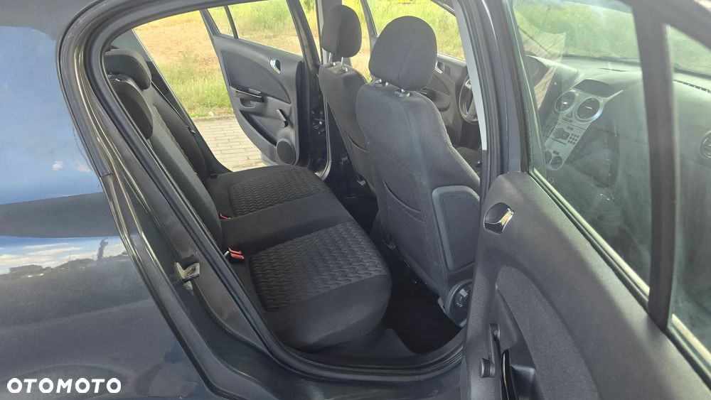 Opel Corsa 1.2 16V Enjoy - 23