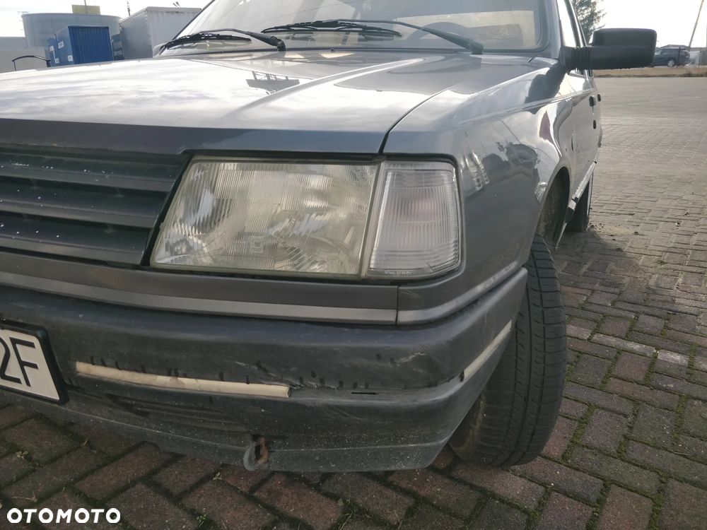 lampa przednia lewa przód Peugeot 309 Lift