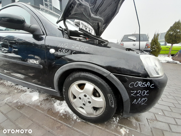 Błotnik Prawy Przedni Przód Opel Corsa C Z20C