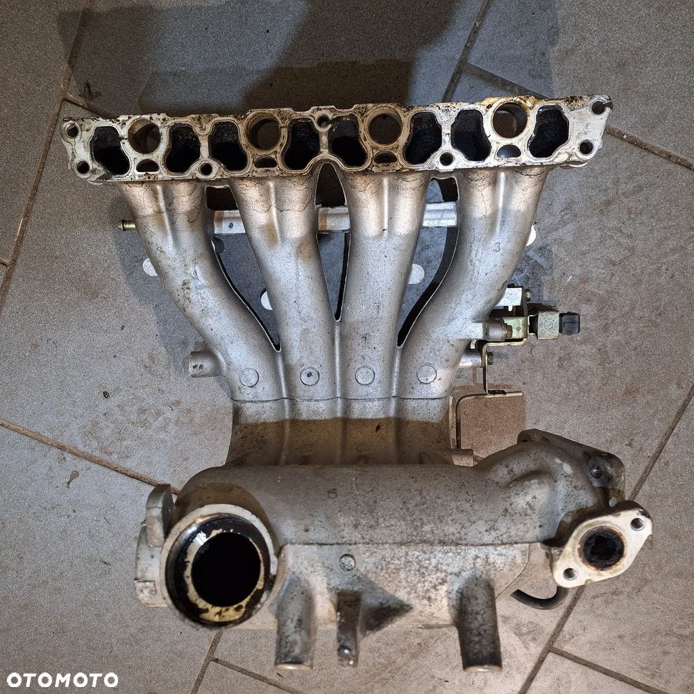 KOLEKTOR SSACY CARISMA 1.8 GDI - 4