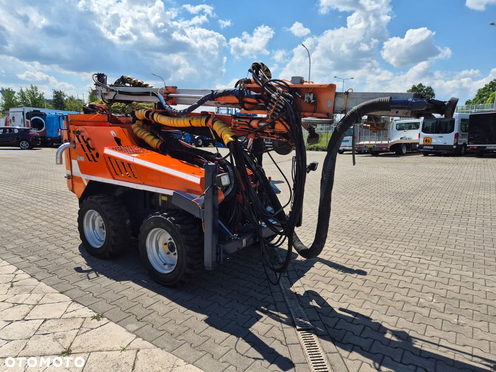 Sandvik Tamrock COMMANDO 120R 4X4 / WIERTNICA DO SKAŁ / SERWISOWANA / 1 WŁ / PEŁNA DOKUMENTACJA / WIELE CZĘŚCI ZAMIENNYCH / ZDALNE STEROWANIE / SILNIK CAT / TRANSPORT / NOWE OPONY - 6
