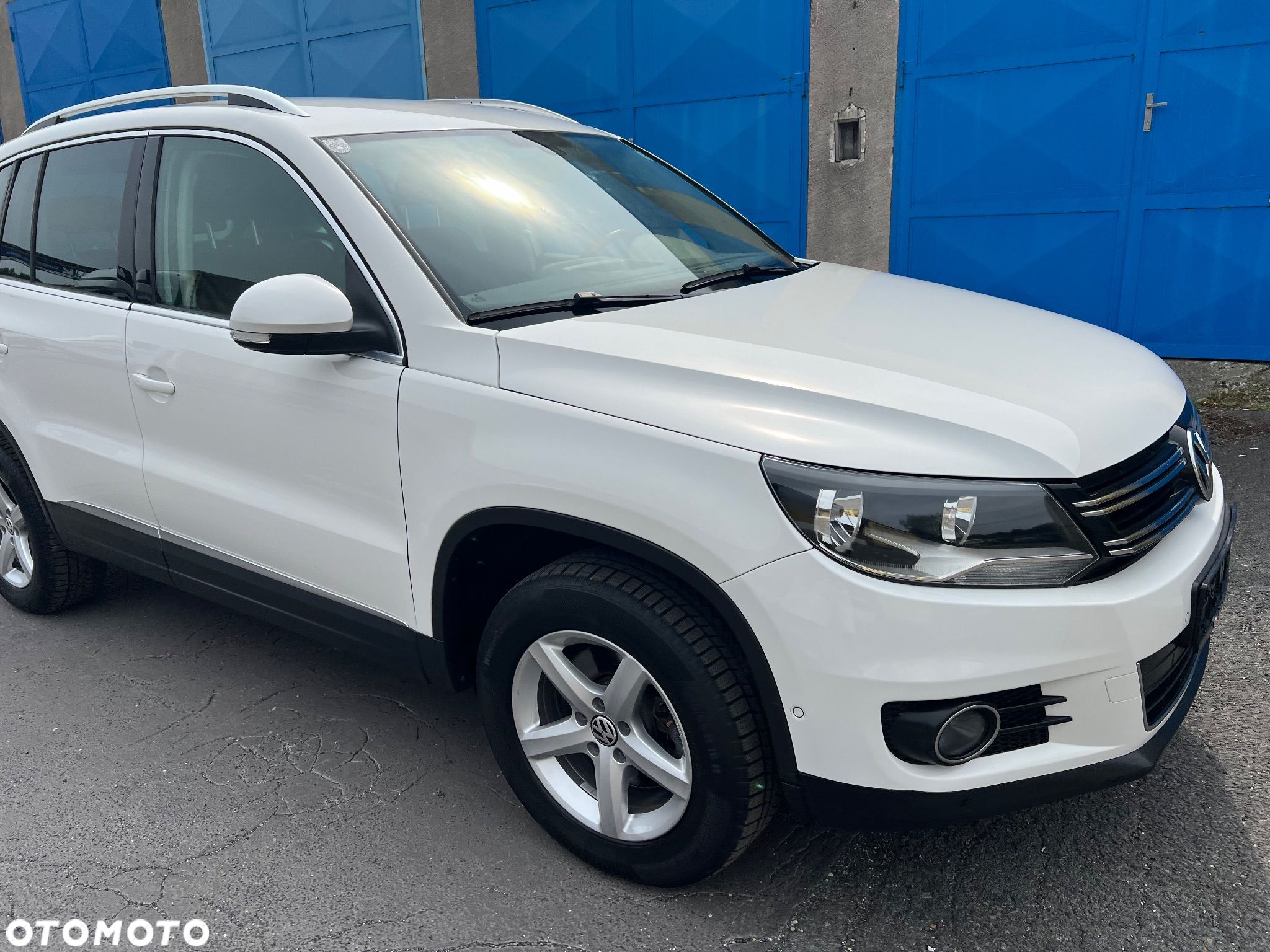 Volkswagen Tiguan 1.4 TSI 4Motion Exclusive - 1